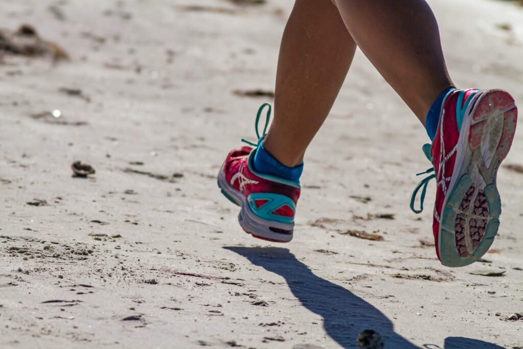 An image of a person running representing Dare 2 Share's blog titled 4 Outdoor Youth Group Games! [With Spiritual Applications]