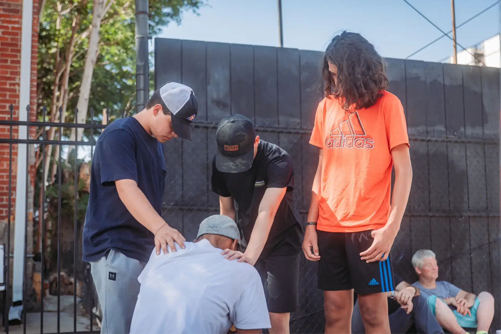 Image of a youth group disciple group sharing the Gospel to create another disciple representing Dare 2 Share's blog on youth discipleship and how it can help grow a youth ministry.