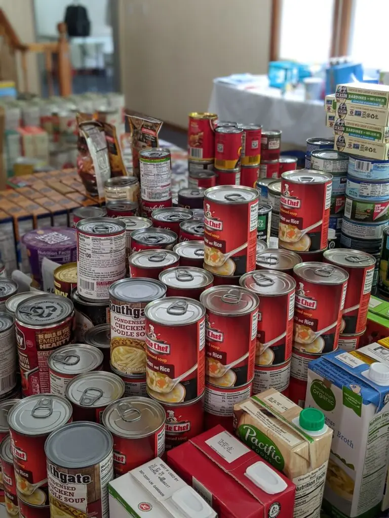 Image of canned goods for a food drive as a fall church outreach idea.