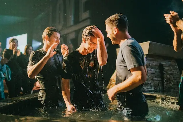 Image of a teenager being baptized representing Dare 2 Share's blog How to Implement the 7 Values of a Gospel Advancing Ministry