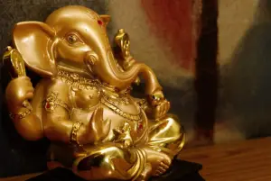 Picture of a golden idol of a Hindu god